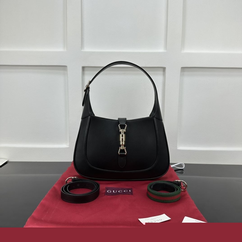 G*u*i top handle bags